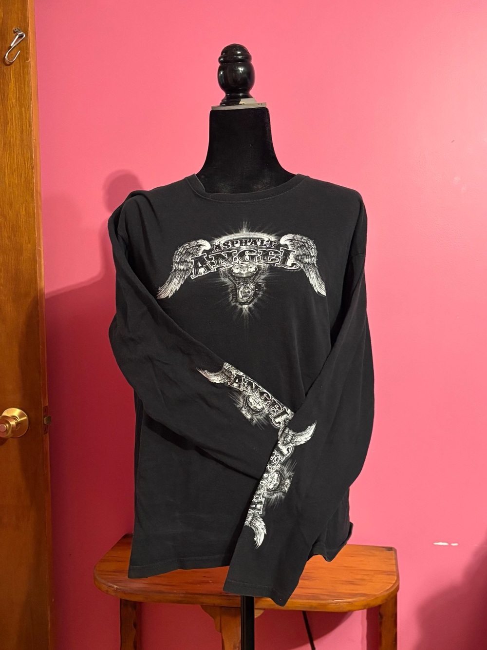 Black Long-Sleeve Graphic Tee with Winged Skull Print